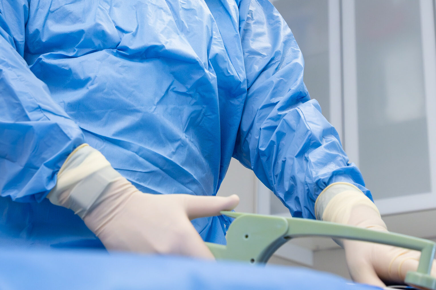 Dr. Faulkner holds the FaceTite device, preparing to administer a patient's facial rejuvenation in Bethesda.