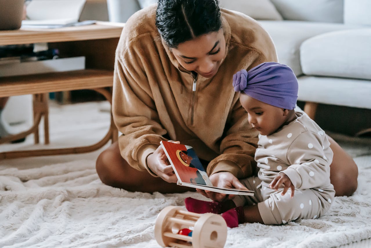 A young mother plays comfortably with her child after recovering from her tummy tuck near Washington, DC.